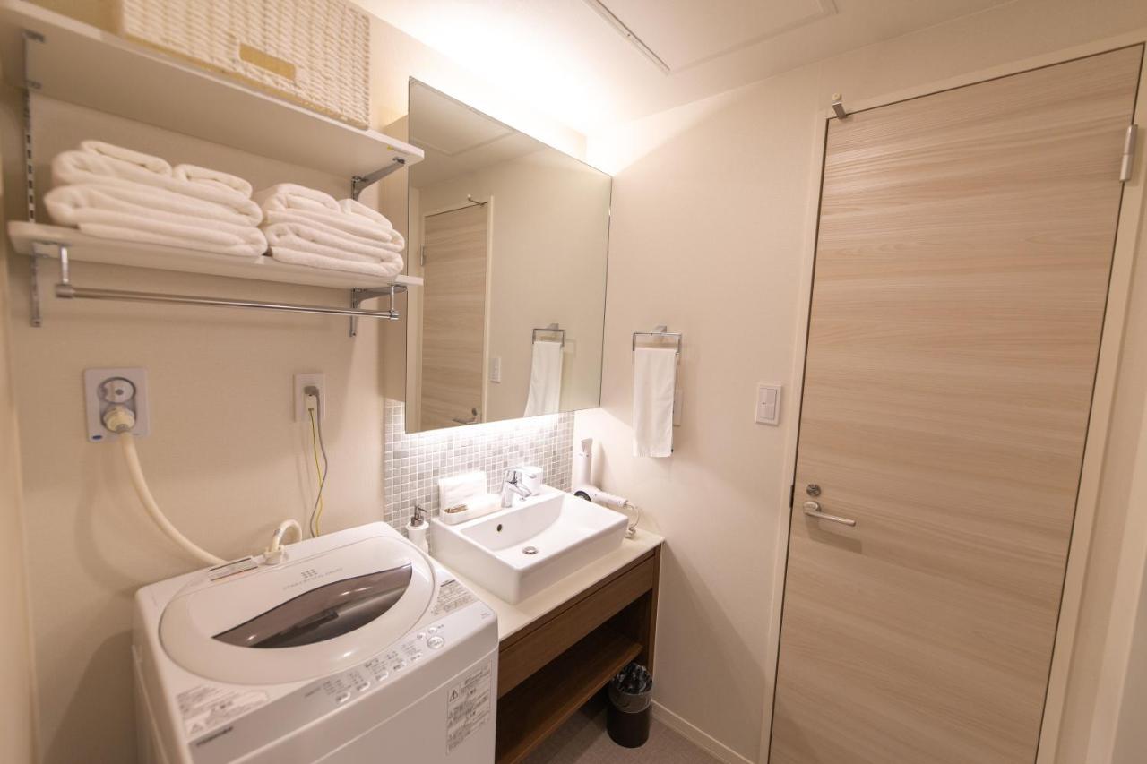 Aparthotel Grand Base Hiroshima Ekimae Exterior foto